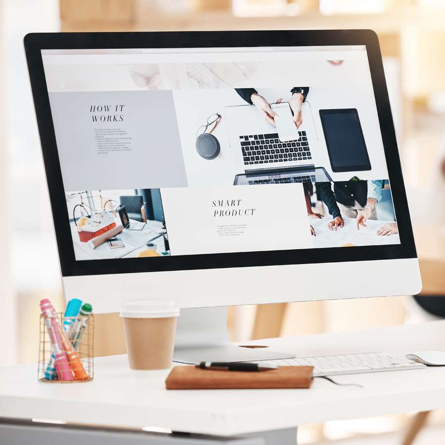 A computer showing a simple sleek web site design