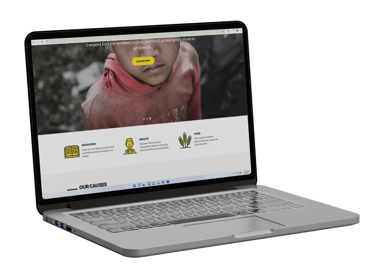 Computer open to laptop to represent web design