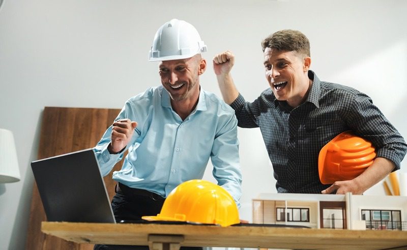 architects celebrating seeing great results from their hard work.
