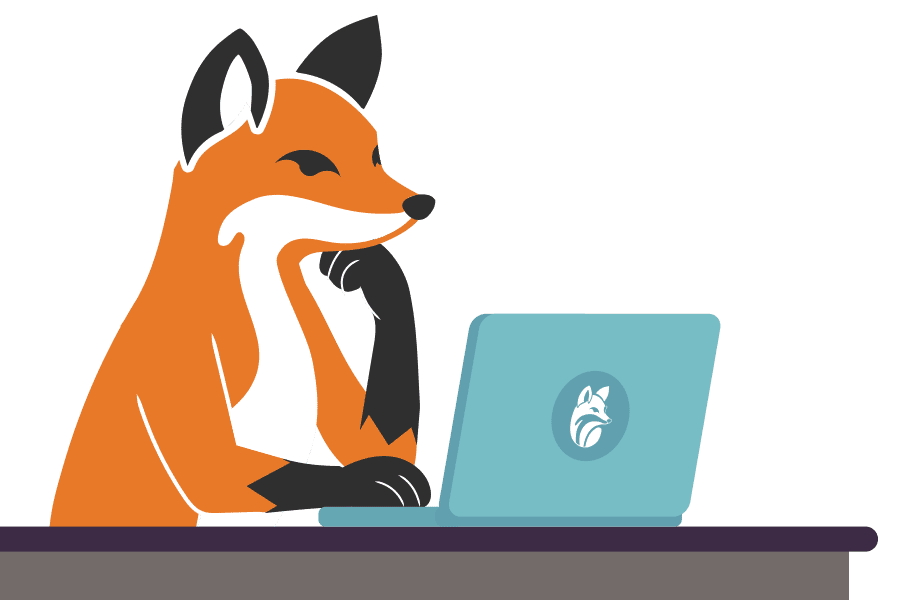 Ash typing out a blog on his laptop.